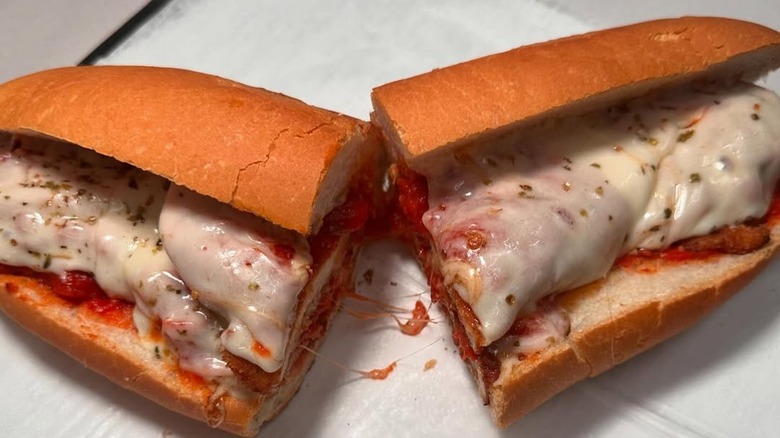 The cheesy Parmesan chicken sub cut in half
