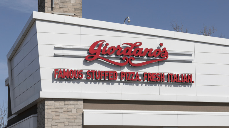 The exterior of Giordano's with the logo and slogan