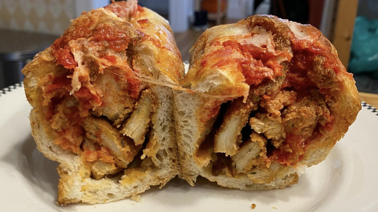 A view of the center of a loaded chicken Parmesan sandwich from Mirabella's