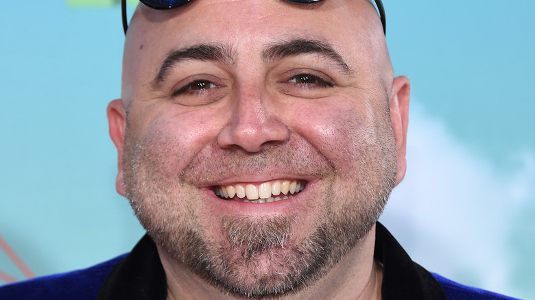 Duff Goldman smiling with sunglasses