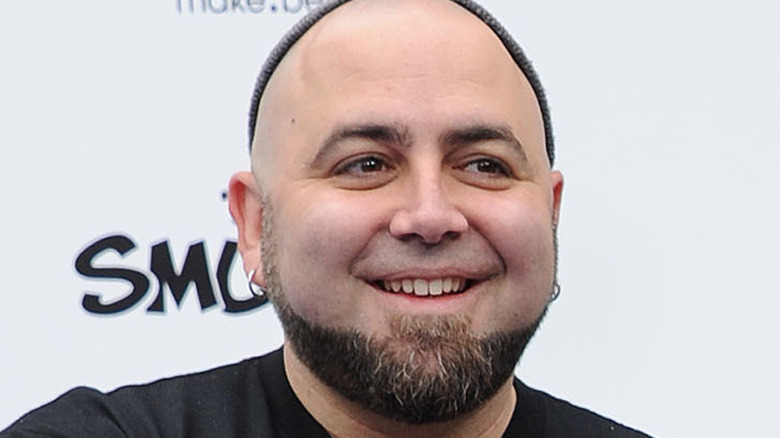 Duff Goldman in a cap and grinning