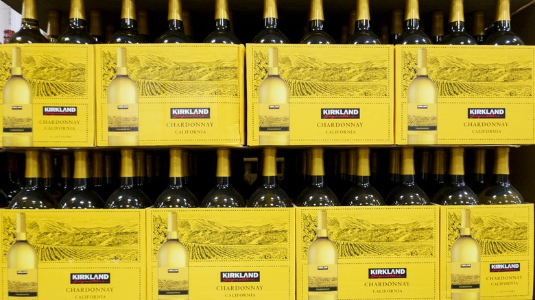 Cases of Kirkland Signature Chardonnay on a shelf at Costco
