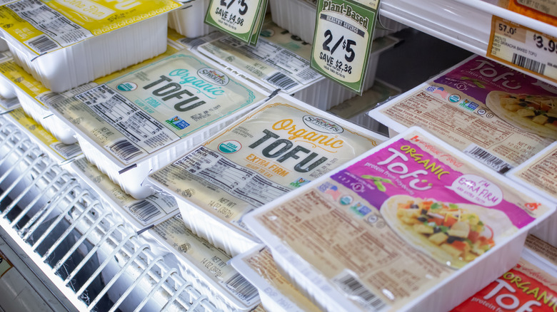 packages of tofu at grocery store