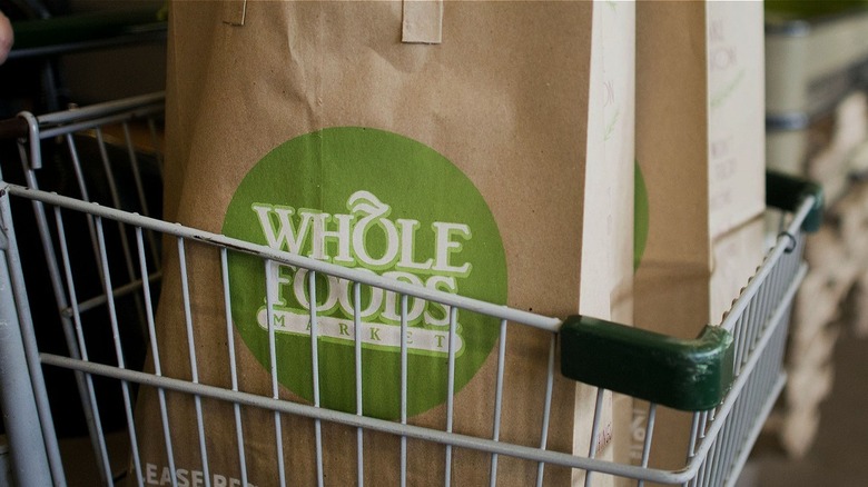 Whole foods paper bag in cart