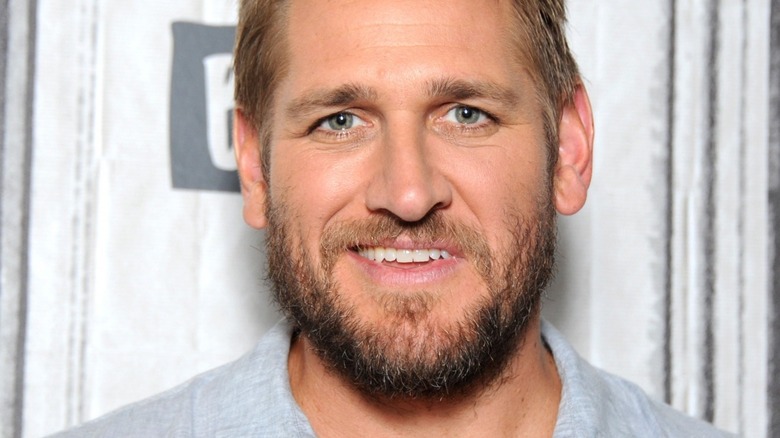 Curtis Stone with beard and slight smile