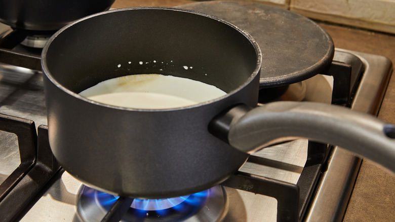 Heating milk on stove