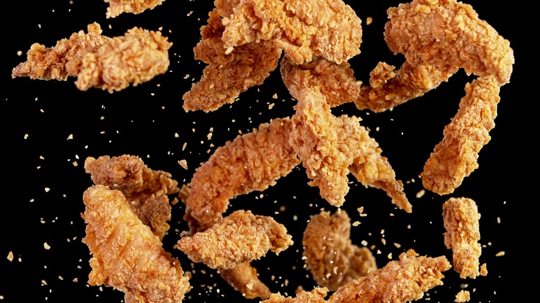 Chicken tenders with black background