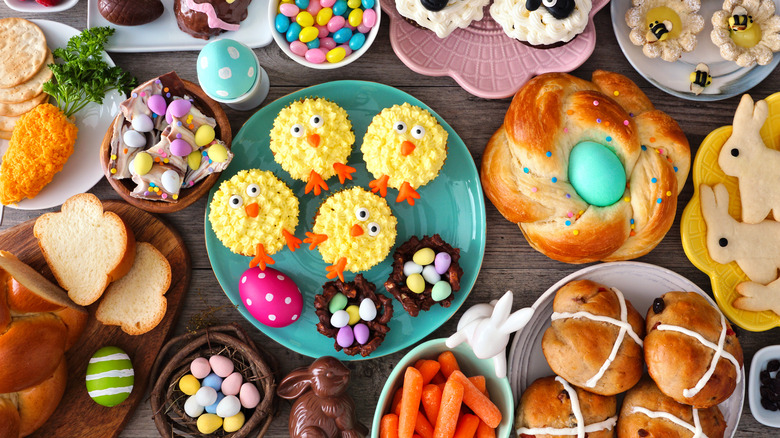 Assortment of colorful desserts on wood table