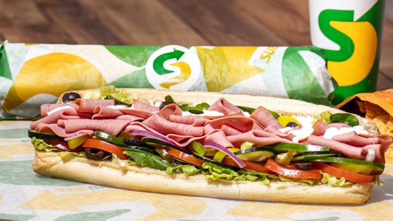 Subway sandwich, chips and drink