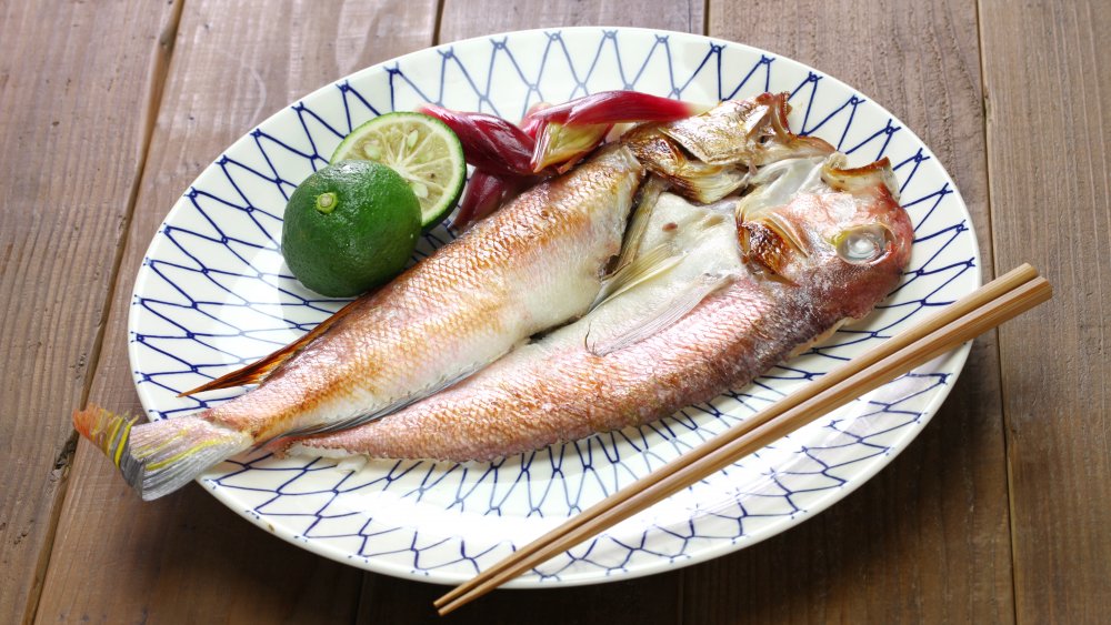 tilefish on plate with chopsticks