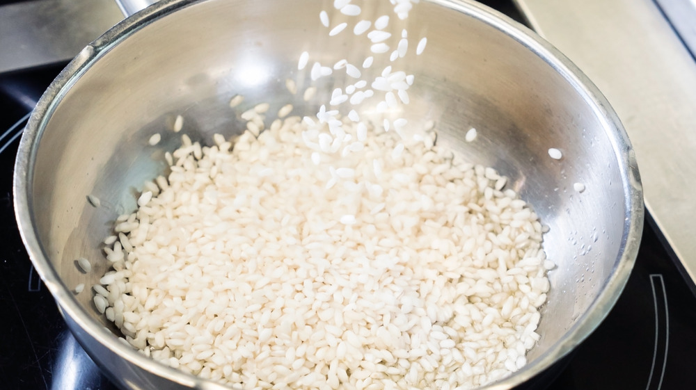 Rice in skillet on stove
