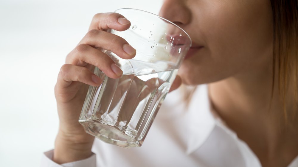 Woman drinking a glass of water