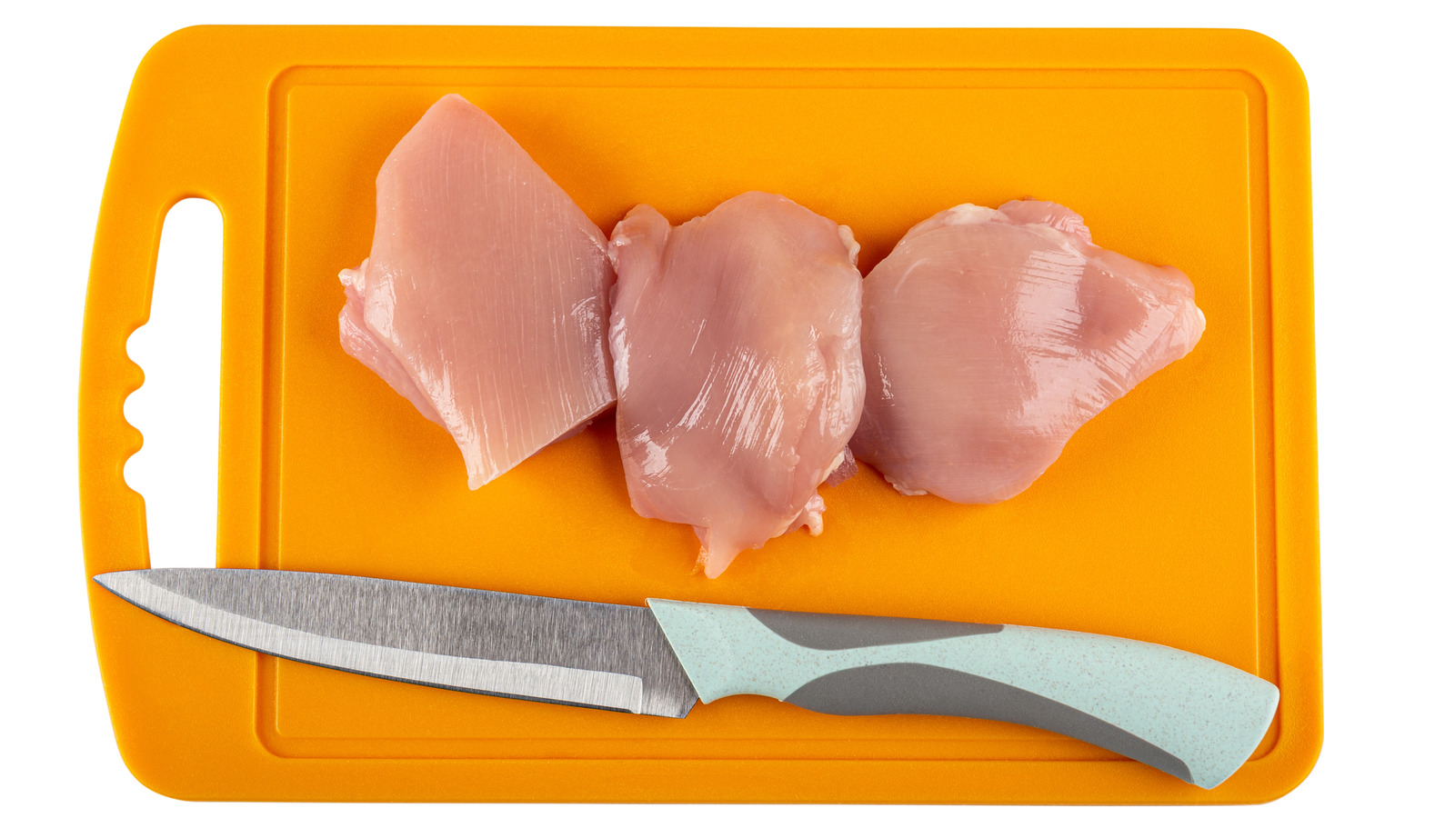 Here's Why You Should Have A Separate Cutting Board For Raw Chicken