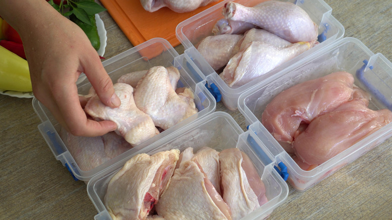 Home cook portioning out a chicken 