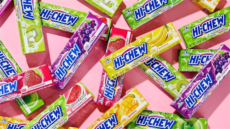 Packets of Hi-Chew candy on pink background