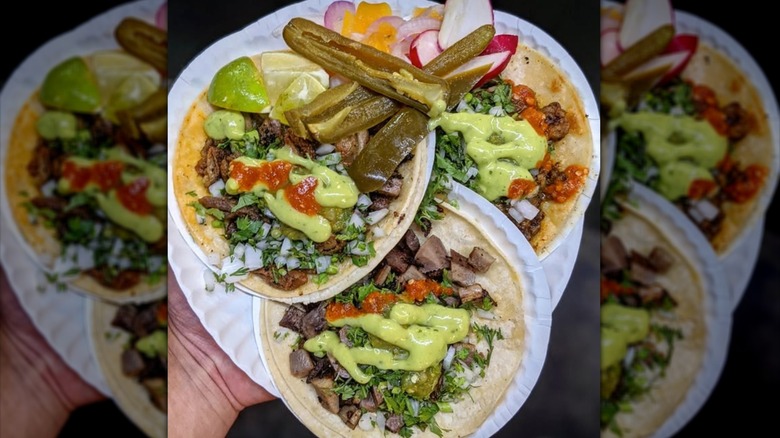 Authentic tacos on paper plate