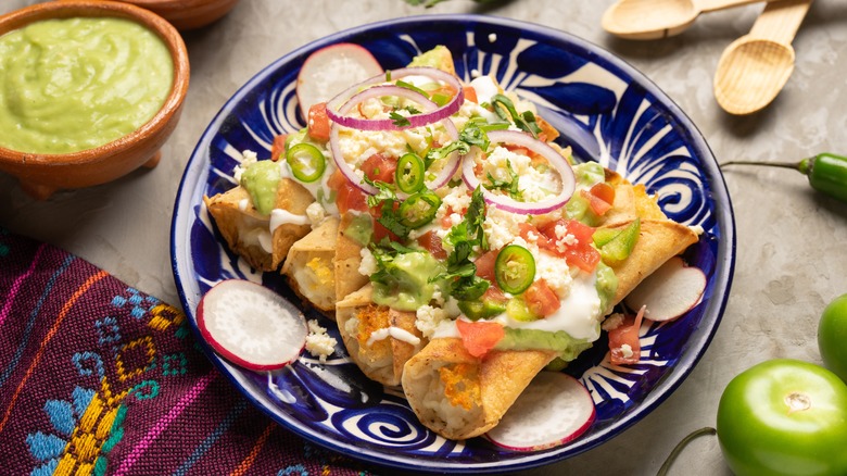 mexican fried potato tacos with toppings