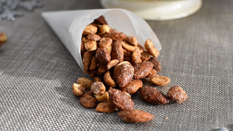 mixed nuts spilling onto table