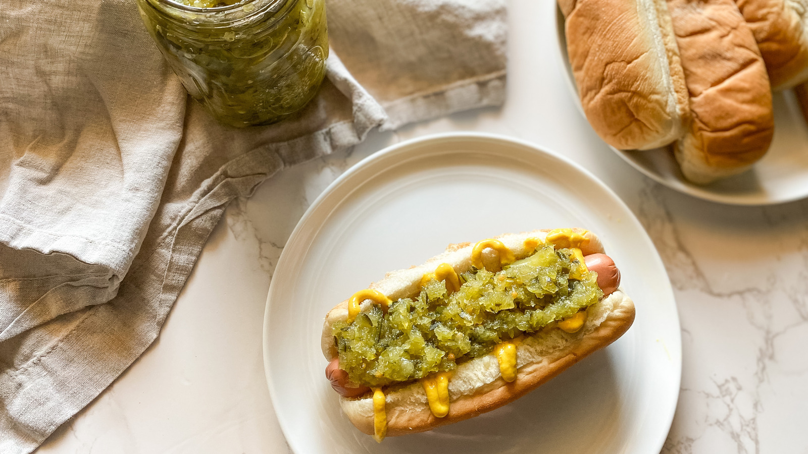 Hot dogs with sweet onion and capsicum relish