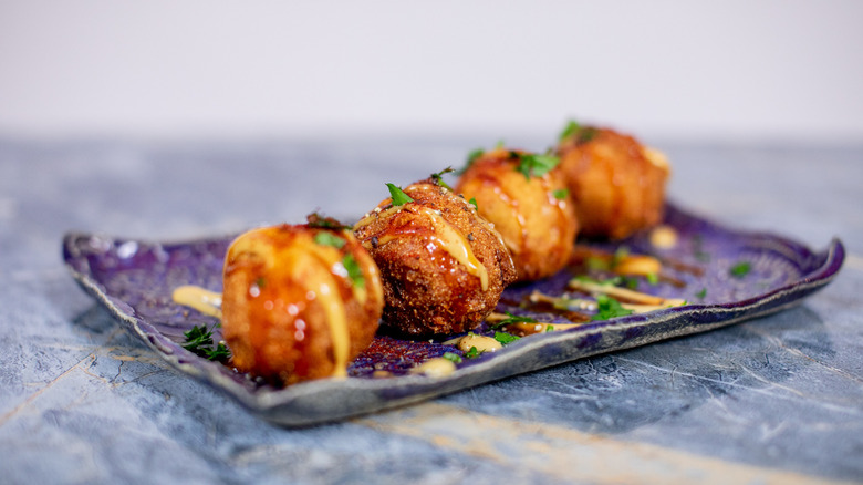 Homemade hush puppies on a plate