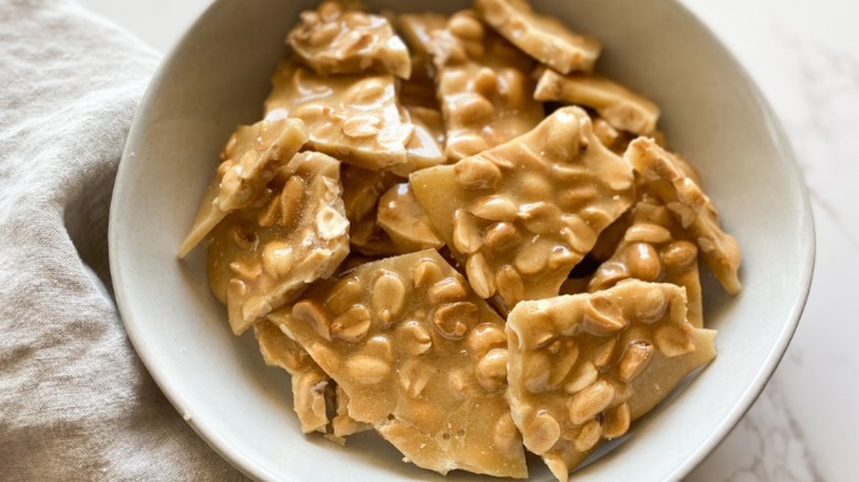 peanut brittle in bowl