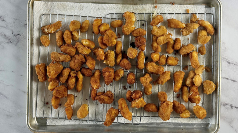 Fried cheese curds on wire racks