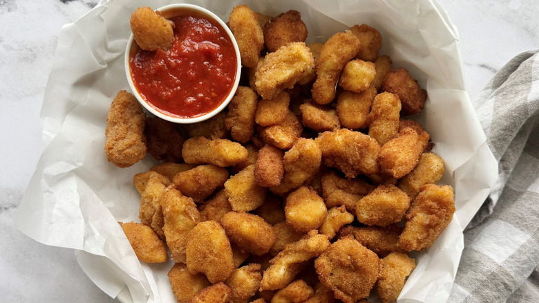 Fried cheese curds with marinara sauce