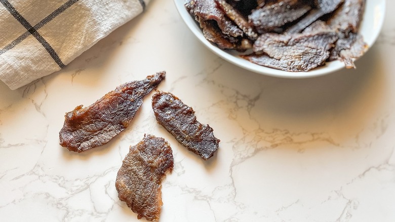 beef jerky pieces on countertop