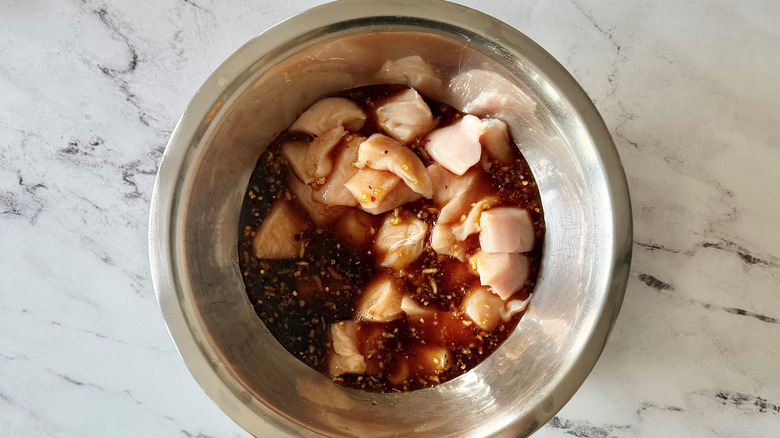 Marinated cubed chicken in bowl