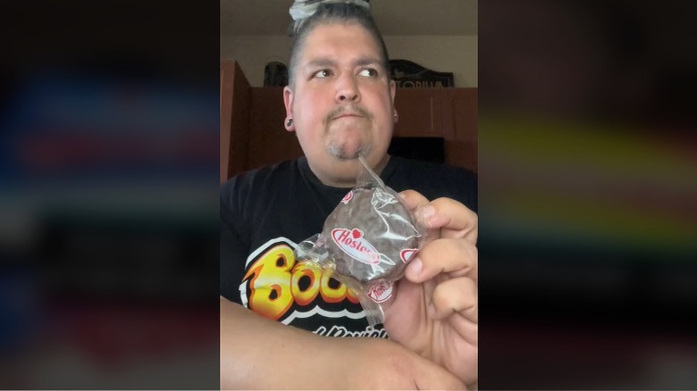 TikToker holding Ding Dongs Twinkie Mashup