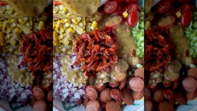 Hot dog salad being made