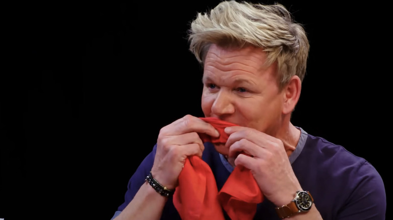 Gordon Ramsay wiping mouth on Hot Ones