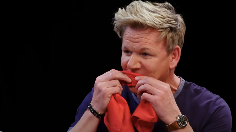 Gordon Ramsay wiping mouth on Hot Ones