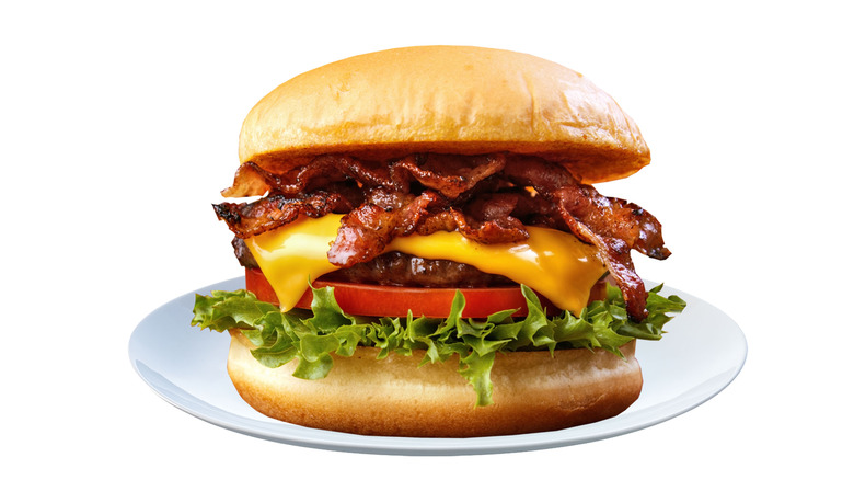 bacon cheeseburger on plate