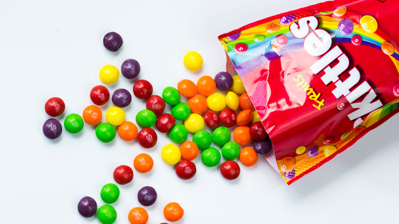 Skittles pouring out of bag