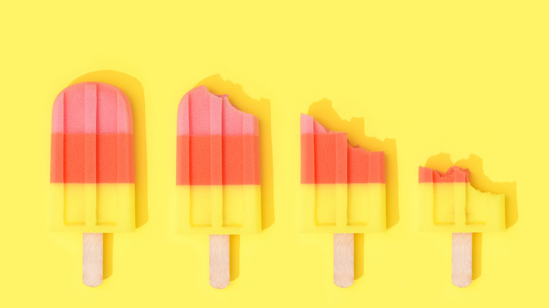 Popsicles on a yellow background