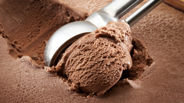 Scooping chocolate ice cream