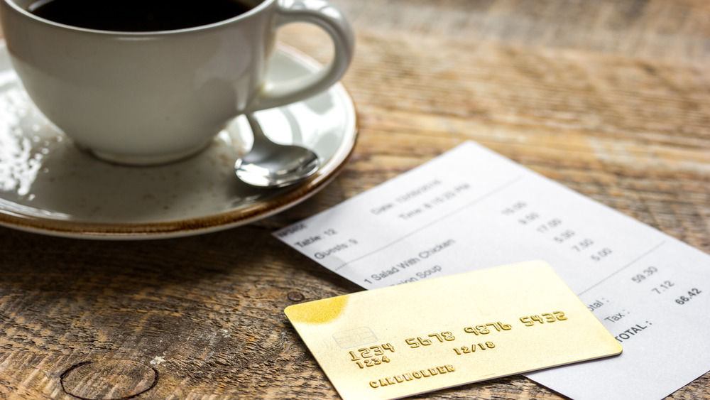 Credit card with cup of coffee