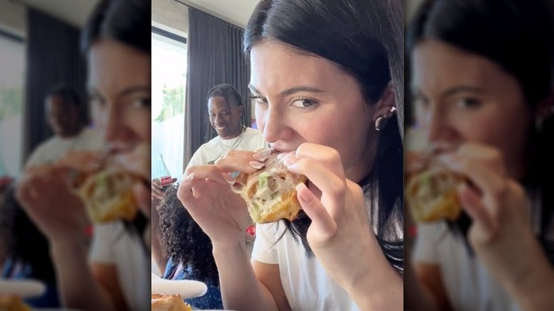 Kylie Jenner eating a sandwich