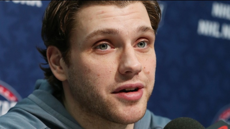 Bobby Ryan speaking into microphone
