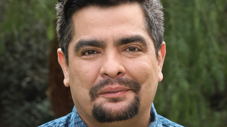 Chef Aaron Sanchez posing outdoors