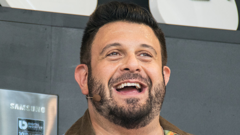 Adam Richman smiling