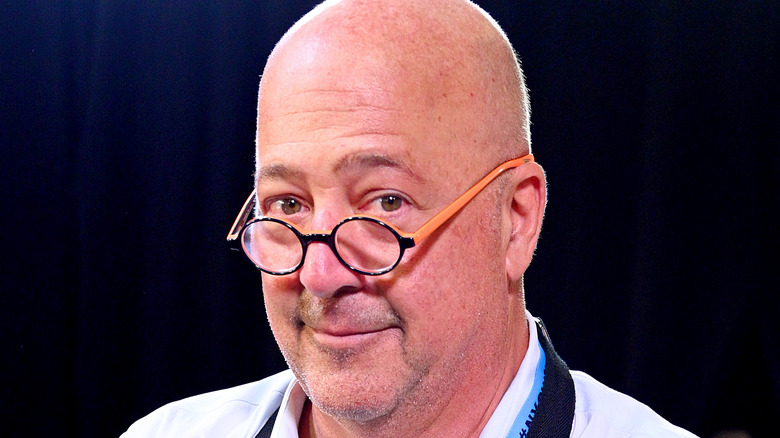 Andrew Zimmern smiling