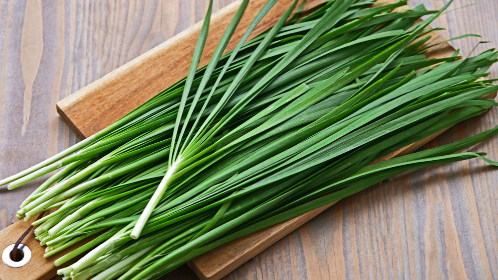 Chives on cutting board