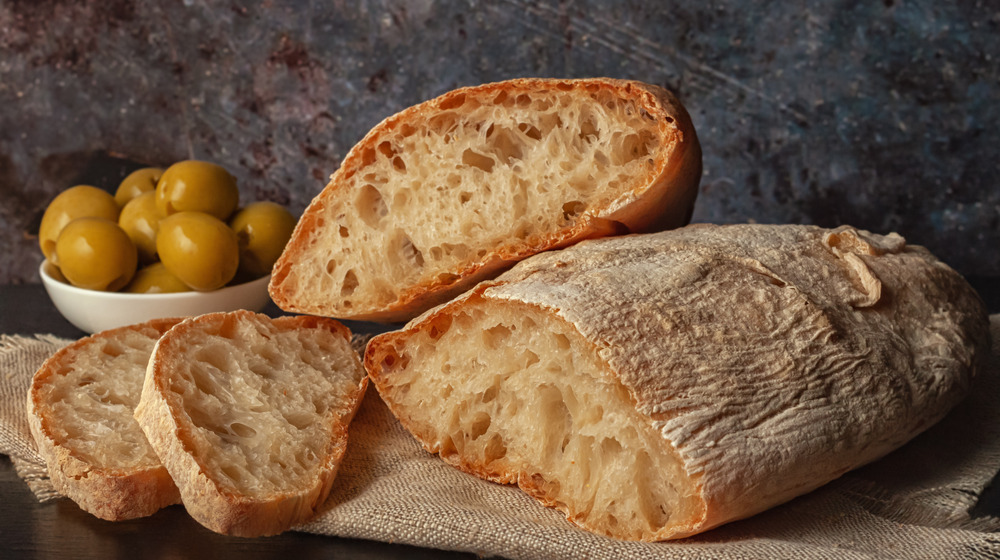 A loaf of ciabatta with olives