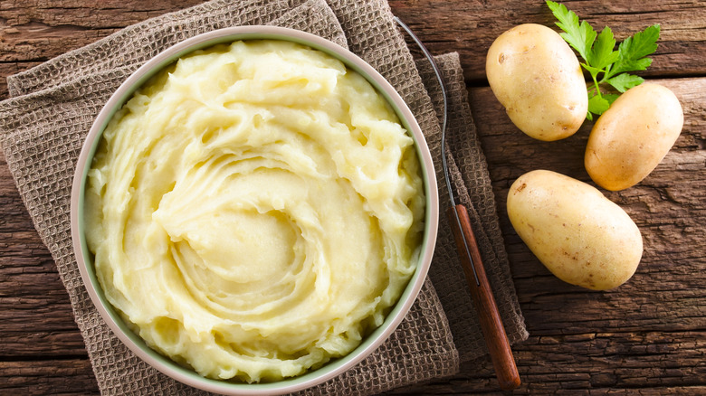 Creamy mashed potatoes in bowl 