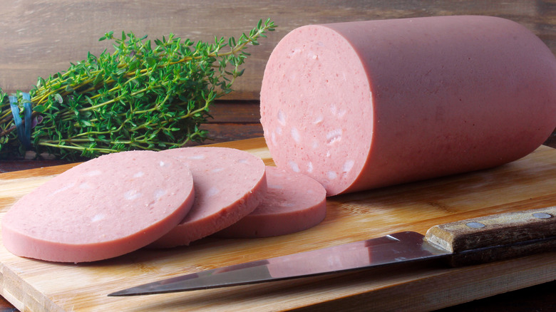 Slices of bologna on a cutting board