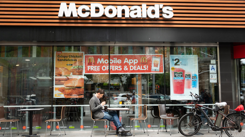 Man in front of McDonald's