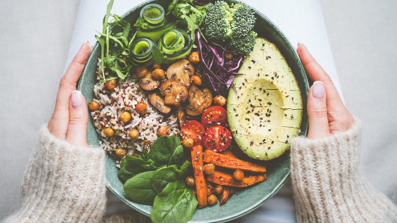 Bowl of  grains, veggies, and mushrooms