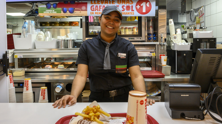 Burger King employees preparing burgers